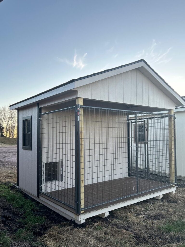 10x10 Dog Kennel Animal shelter with beige painted siding, black trim, and black asphalt shingled roofing for sale near Vermillion, SD