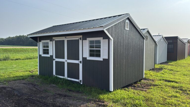 10x16 Quaker shed with Iron Ore Gray painted siding, white trim, and black steel metal roofing for sale near Ames, Iowa