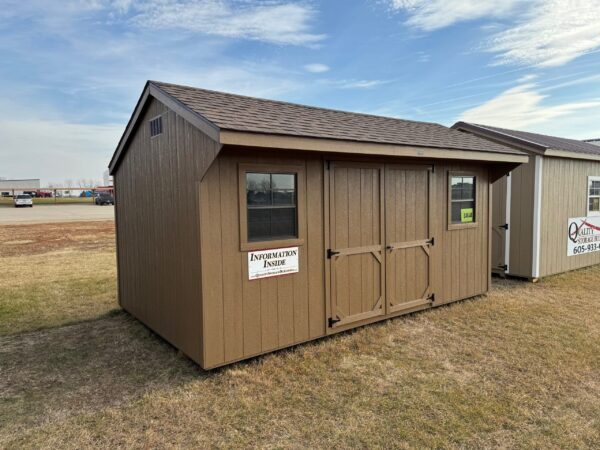 Brown Quaker shed in shed lot