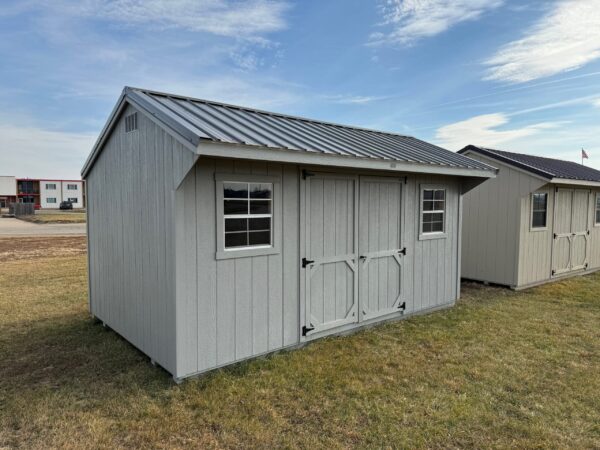 Gray Quaker shed in shed lot