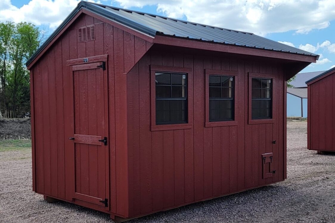 8x12 Rookwood Red Chicken Coop with 3 windows, matching trim and black steel metal roof available for custom order and delivery to Wessington Springs, SD