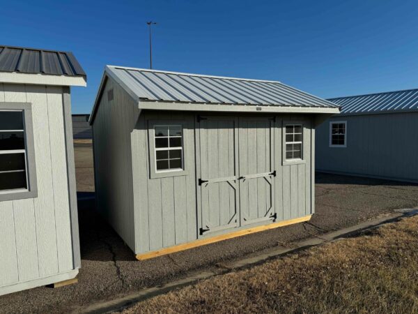 Grey Quaker shed in shed lot