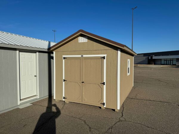 Tan Ranch shed in shed lot