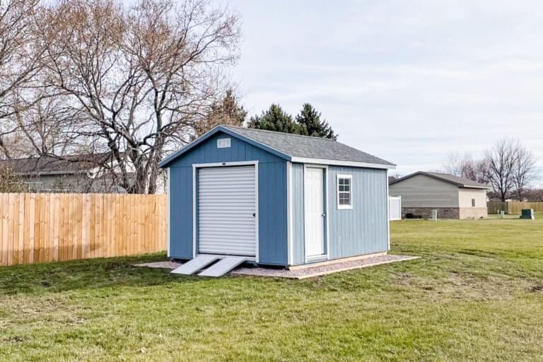 Blue backyard detached shed with ramp