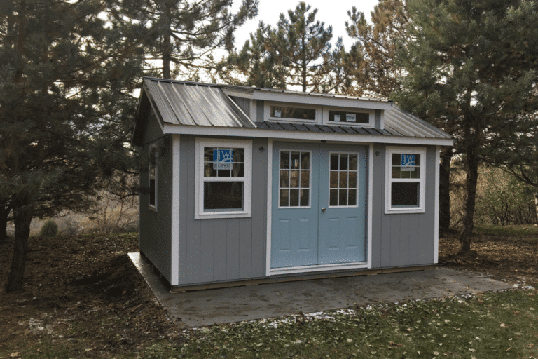 grey and blue southern classic shed in hartford sd